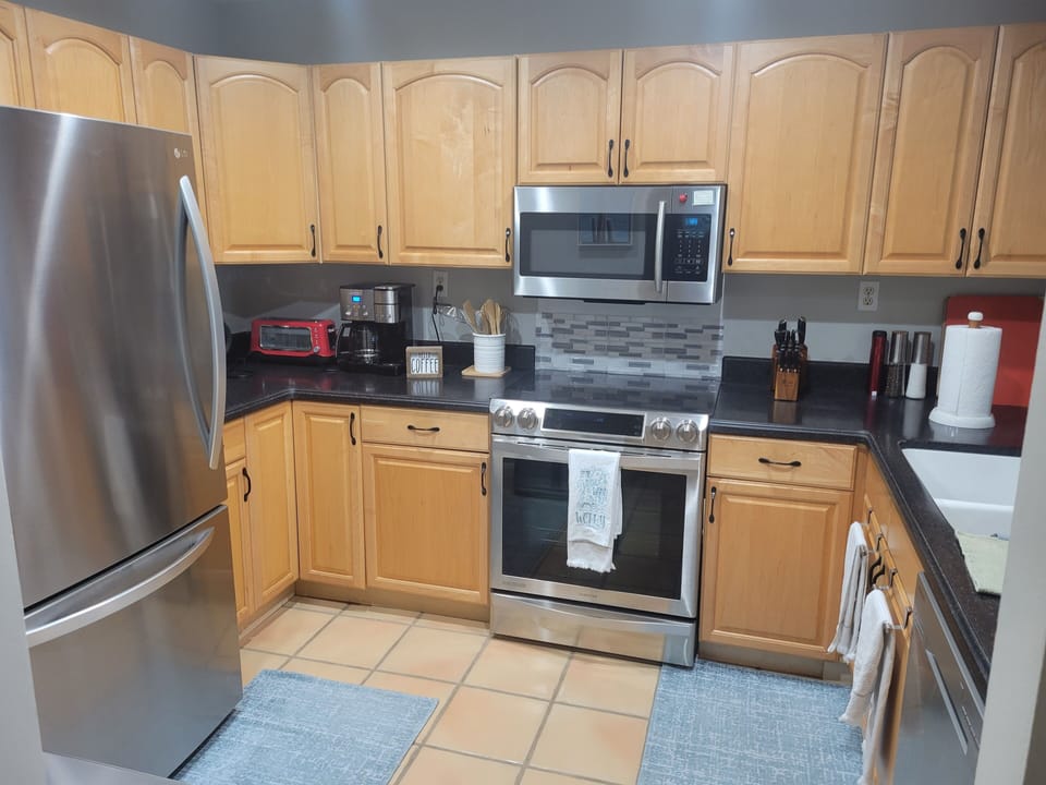 Kitchen with newer appliances and Induction cooktop.