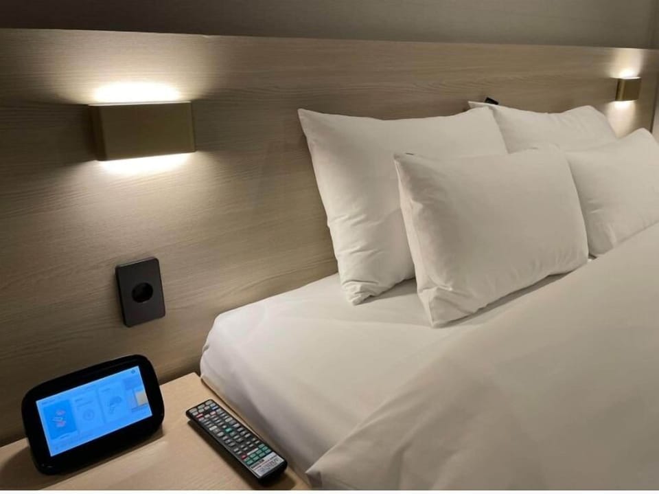 Deluxe Double Room | Premium bedding, down comforters, desk, laptop workspace