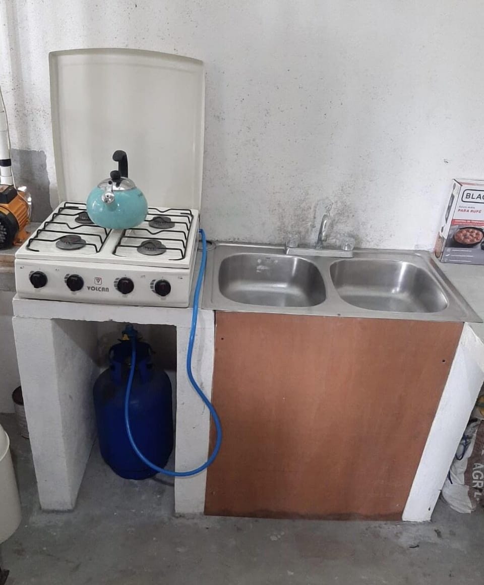 Gas stove and a sink.