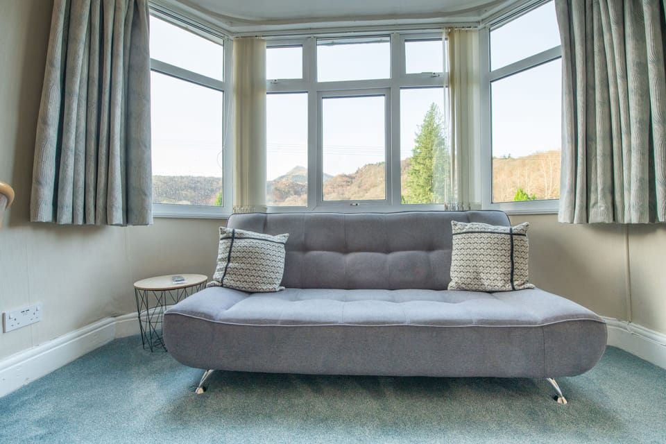 Family Room, 1 King Bed with Sofa bed, Mountain View | Desk, iron/ironing board, free WiFi, bed sheets