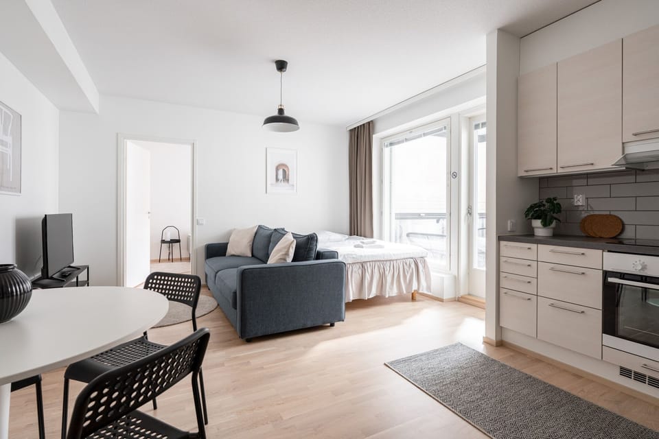 Exclusive Apartment | Living area | 42-inch Smart TV with cable channels, TV