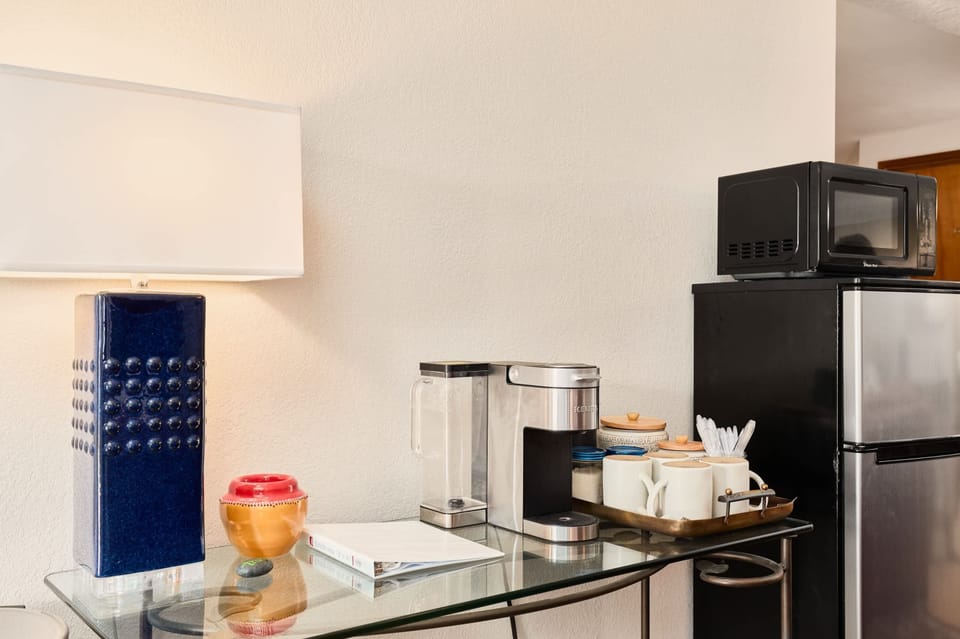 Kitchenette- fridge, microwave, coffee, dishes