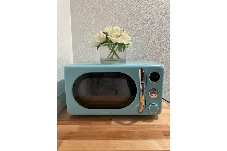 Yes you have a full kitchen with a microwave. 