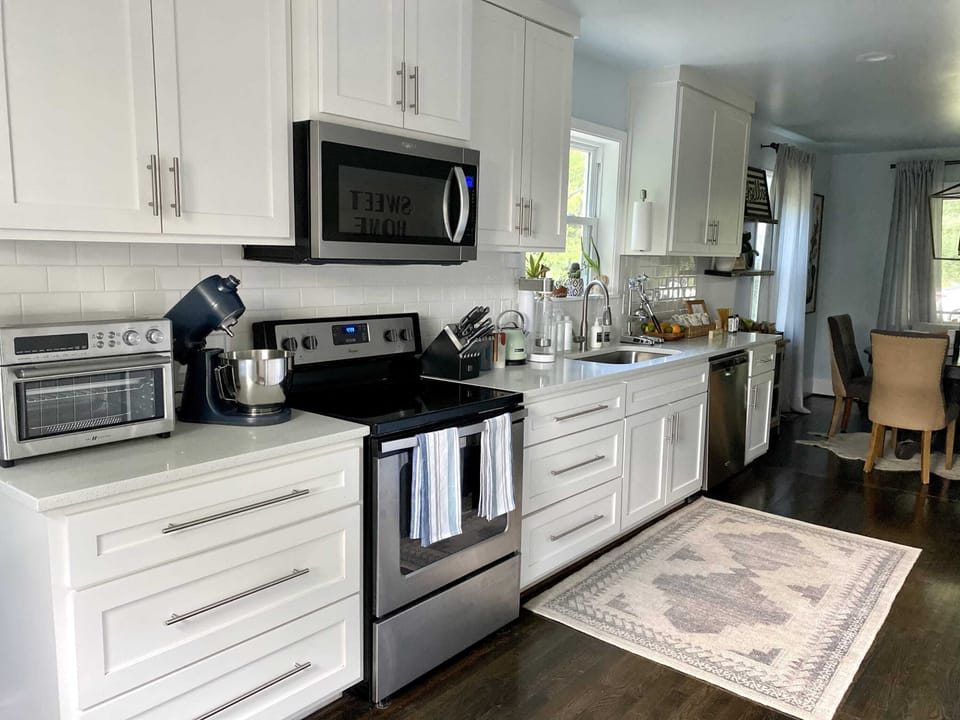 Enjoy effortless cooking in this vibrant, spacious kitchen with modern  appliances