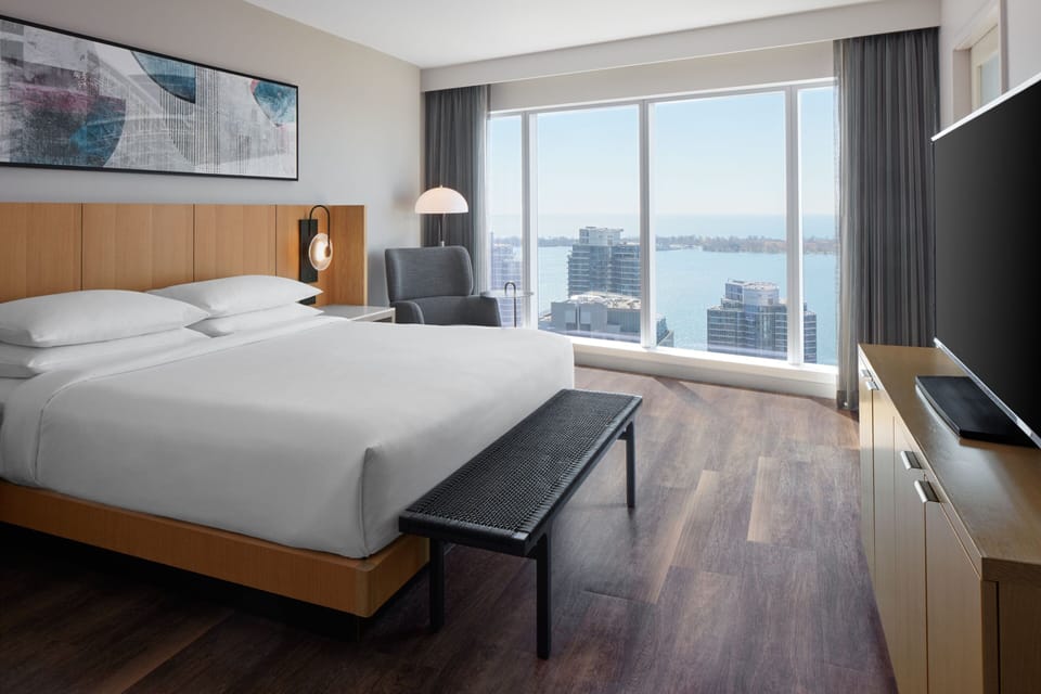 Executive Suite, 1 Bedroom | In-room safe, desk, iron/ironing board, free cribs/infant beds