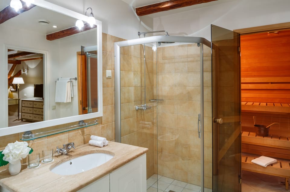 Designer toiletries, hair dryer, bathrobes, slippers
