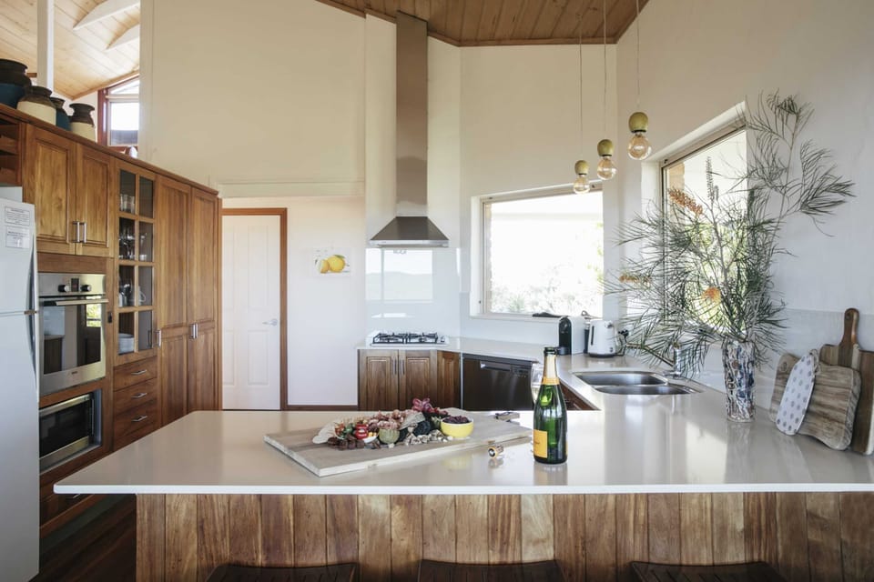 Baan Sabai - Angourie accommodation - Kitchen with ocean & National Park views