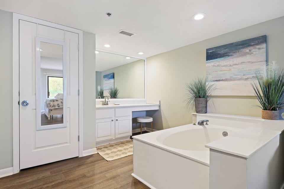 Vanity area. Soaking tub