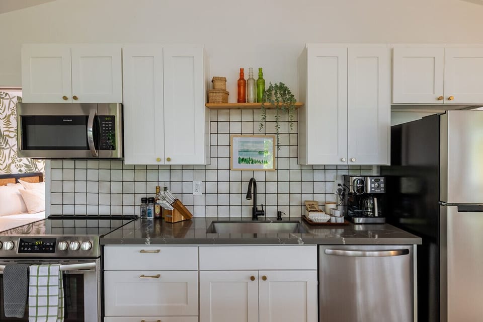 Bright, functional kitchen with all-new appliances and your choice of coffee maker or French Press to start the day right.