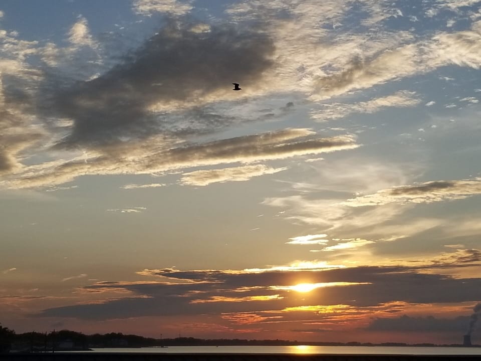Oh the sunsets!  Taken from the private beach area in our complex.