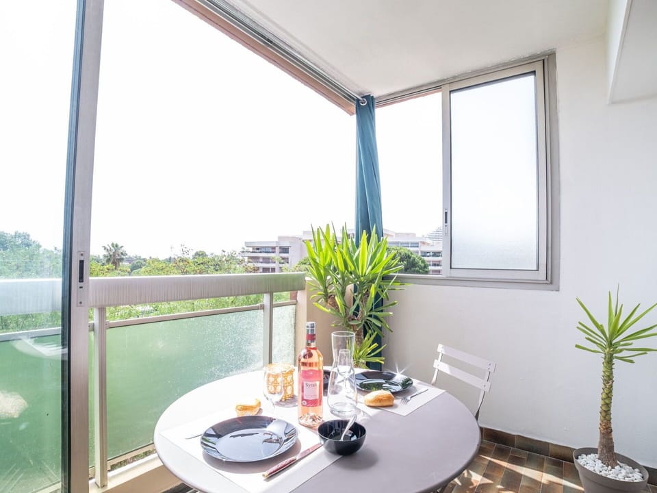 Table, Plant, Building, Furniture, Property, Tableware, Window, Flowerpot, Sky, Houseplant