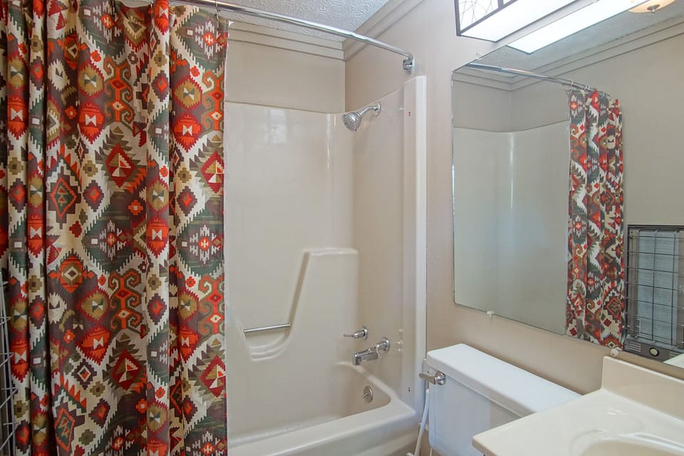 This bathroom is located inside the master bedroom on the main level.