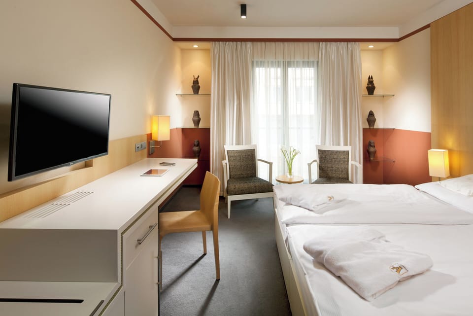 Deluxe Room | 1 bedroom, minibar, in-room safe, free WiFi