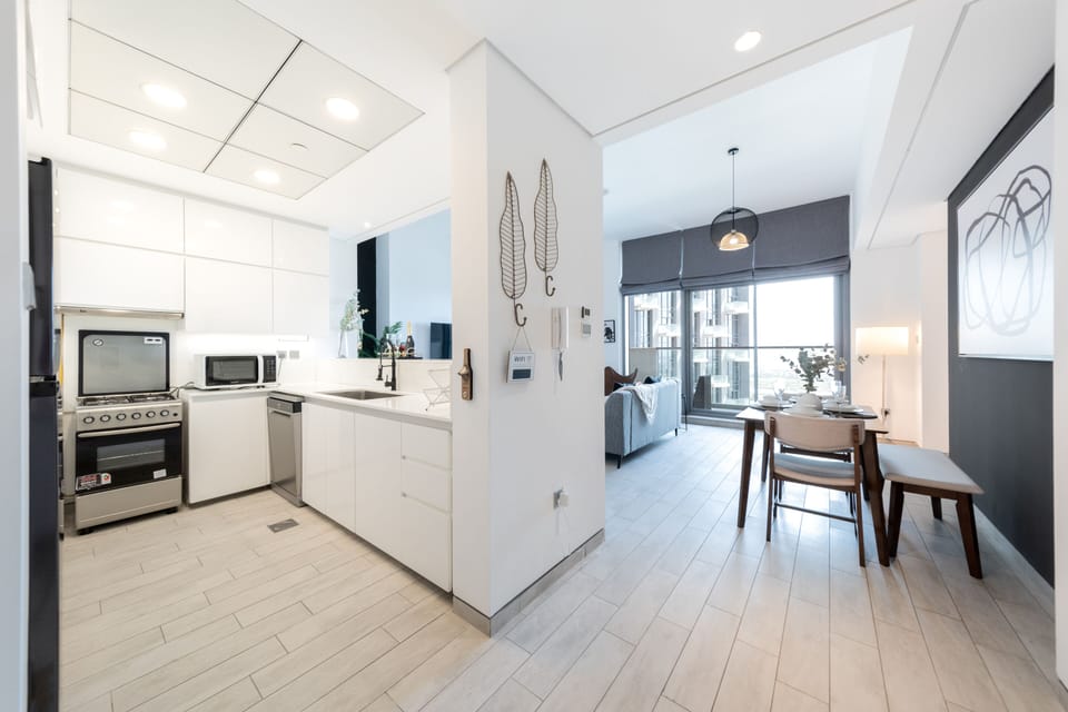 Premium Apartment, 2 Bedrooms, Non Smoking, Pool View | Private kitchen | Full-size fridge, microwave, oven, stovetop