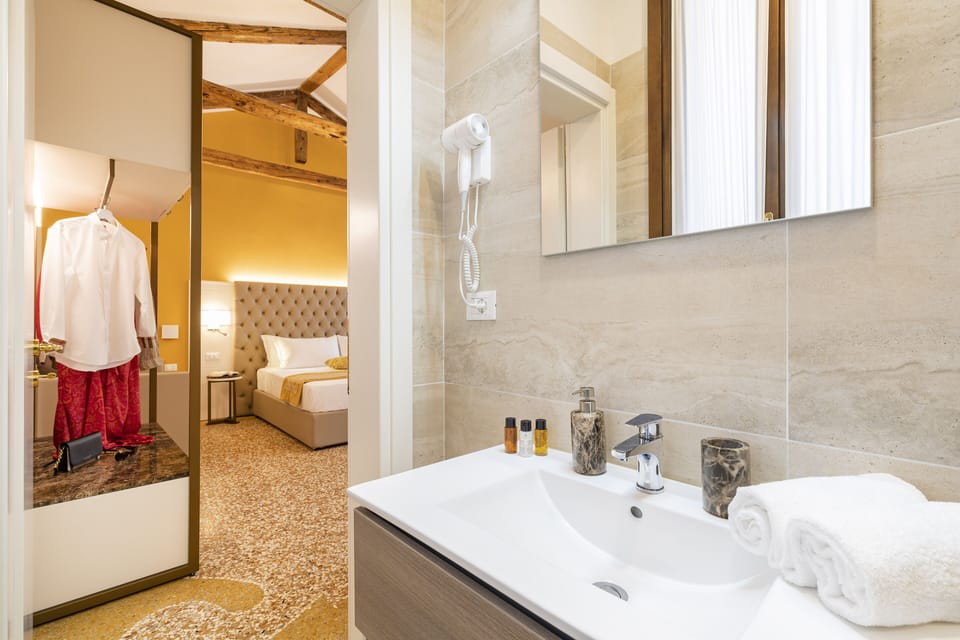 Deluxe Triple Room (Deluxe Marco Polo) | In-room safe, desk, laptop workspace, free WiFi