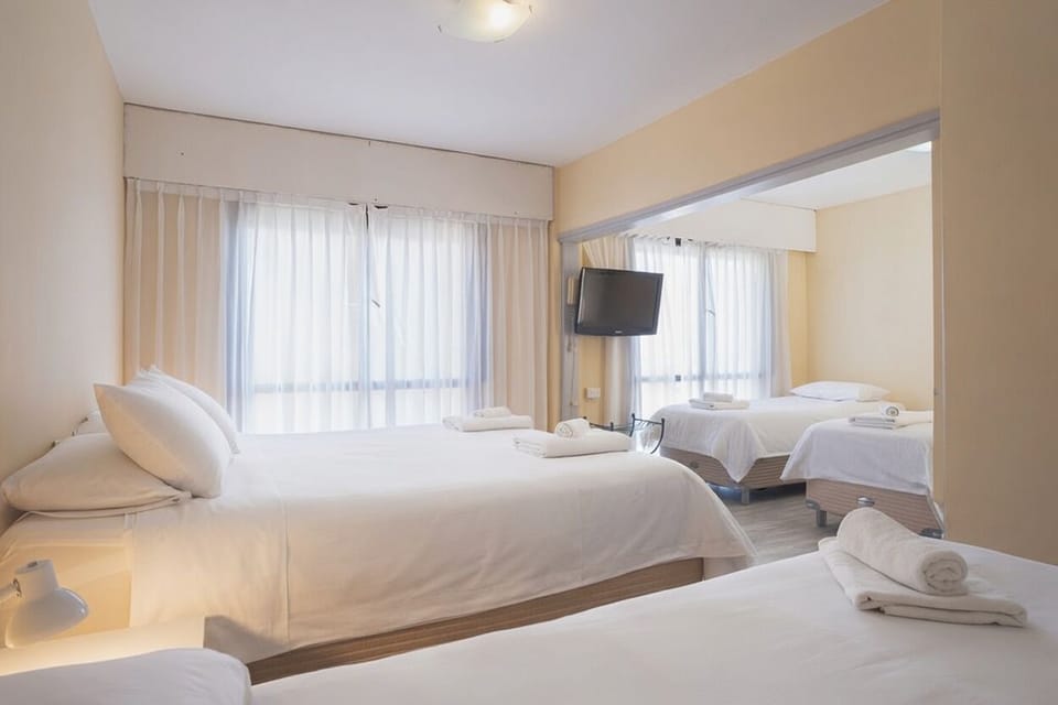 Family Room | Hypo-allergenic bedding, down comforters, in-room safe, free WiFi