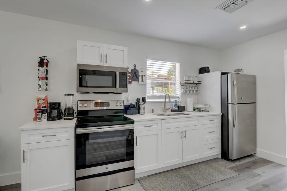 The Kitchen Includes a Blender, Coffee Maker, Microwave and More!
