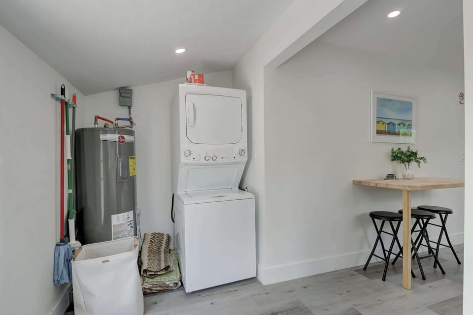 The Utility Room Contains the Stackable Washer and Dryer