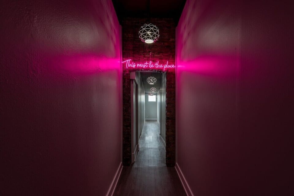 Shared interior hallway entrance to all three apartments
