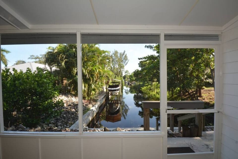 Breathtaking long canal view from the lanai .