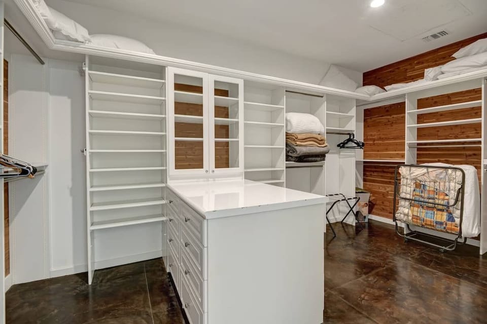 Spacious walk-in closet in the primary bedroom.