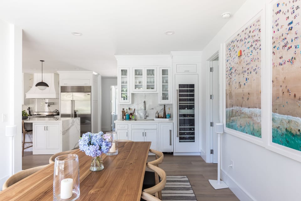 Main house dining area with wet bar, 300 bottle wine fridge and ice maker.