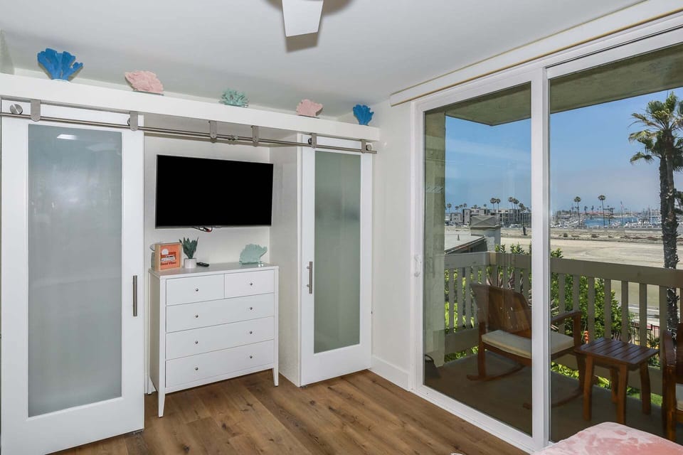 Smart TV and custom built in closets in the master bedroom