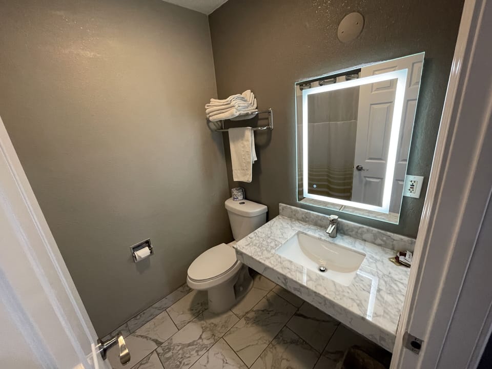 Shower, towels, soap, shampoo