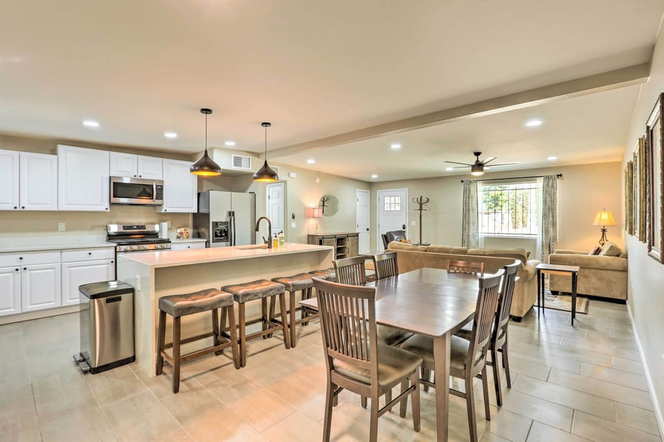 Dining Area | Dishware & Flatware Provided | Breakfast Bar w/ Additional Seating