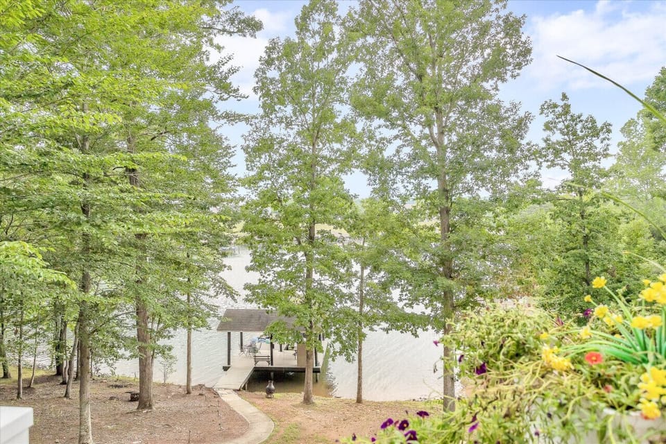 Enjoy easy lake access with a gently sloped lawn that is perfect for relaxing.