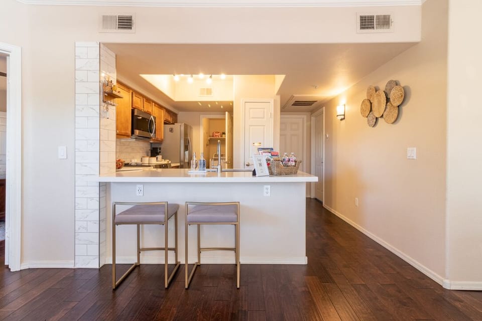 In 2024 we replaced the countertop, sink, backsplash and opened up the kitchen. It's a simple place to sit and have a conversation while cooking on the induction stove, microwaving breakfast sandwiches, or enjoying coffee/tea from Starbucks or AJs.