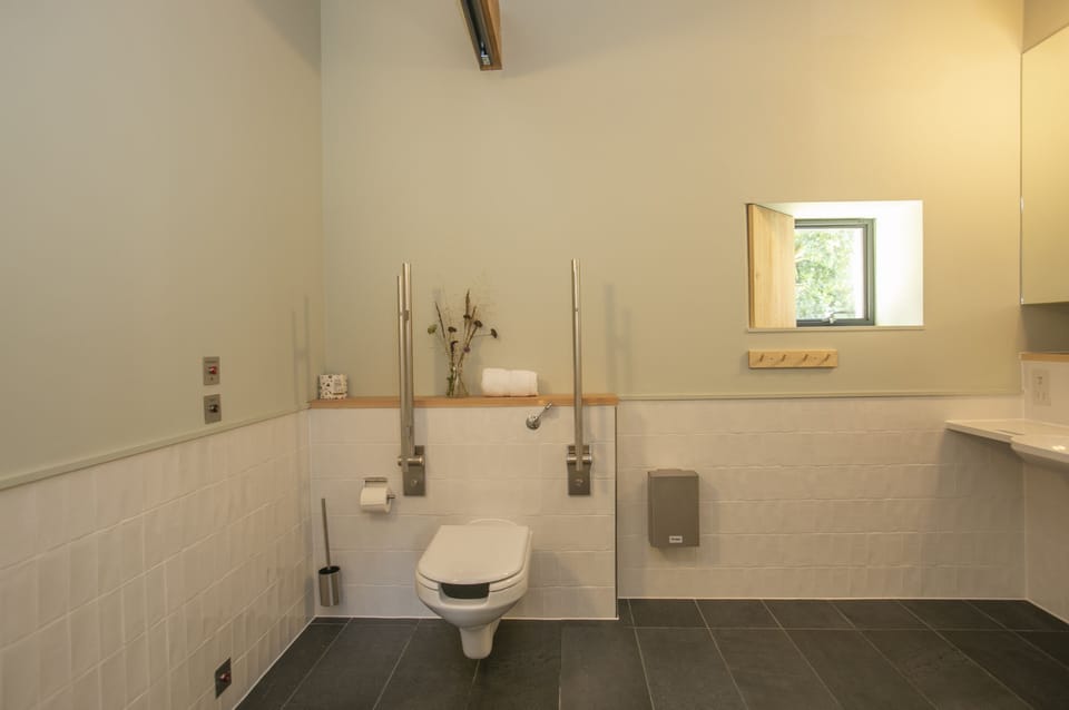 Lookout, near Dorchester: The wheelchair accessible wet room with hoist rail from bedroom