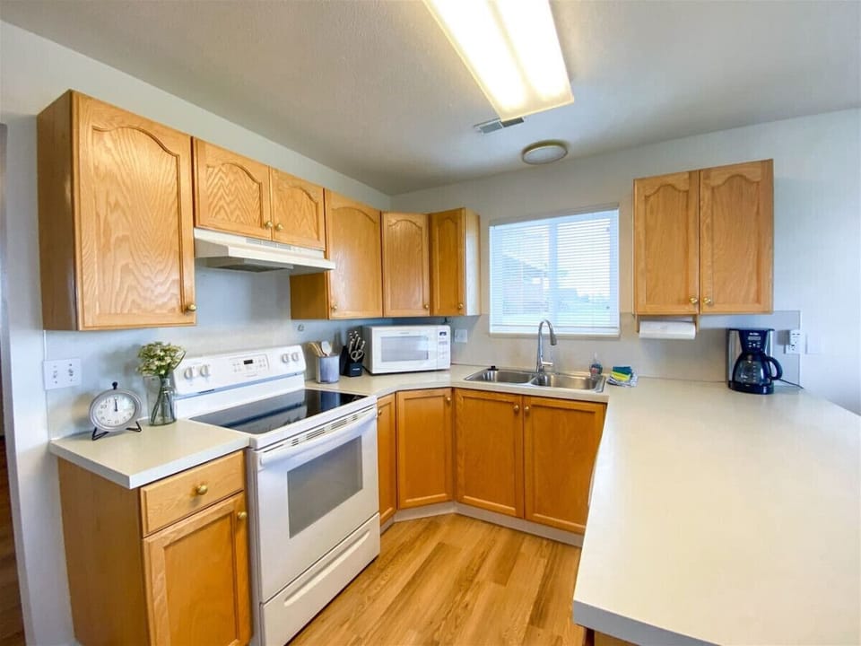 Fully equipped kitchen with ample counter space and cabinetry