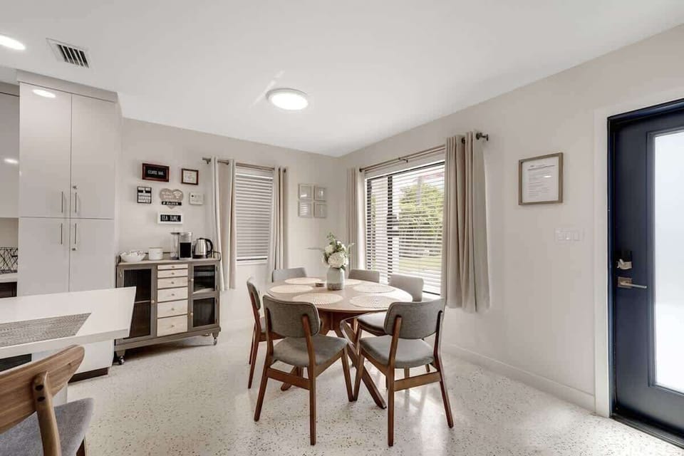 Dining area with 6 chairs.