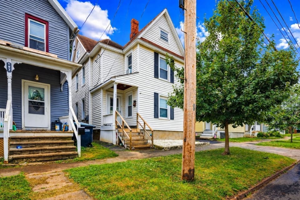 Street-facing entrance with covered porch