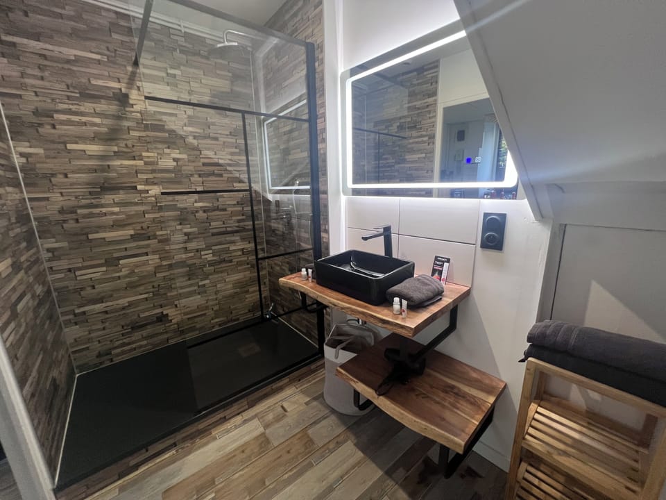 Honeymoon Double Room | Bathroom | Shower, rainfall showerhead, hair dryer, bathrobes