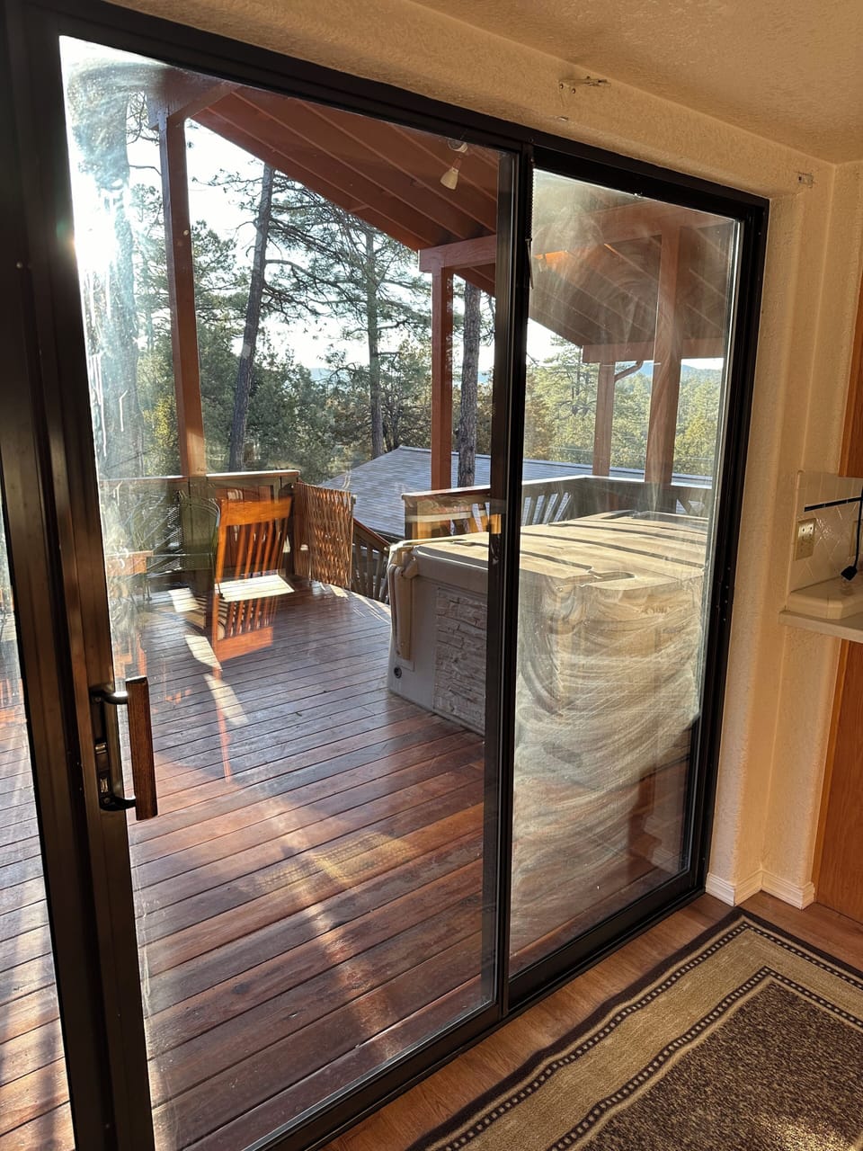View of the east side deck from the kitchen/dining area.