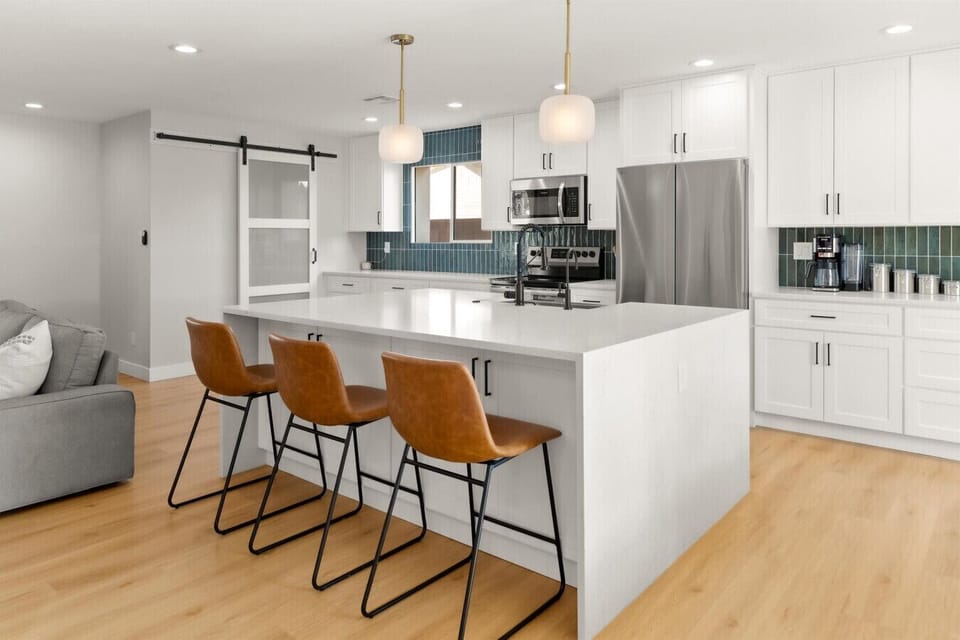 Bright, open kitchen with a massive island for hanging out while you prep meals.