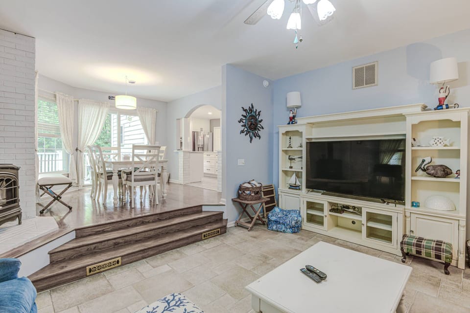 View of dining area and living area.