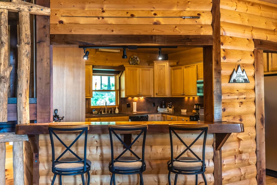 Bar with pass-thru window into kitchen...