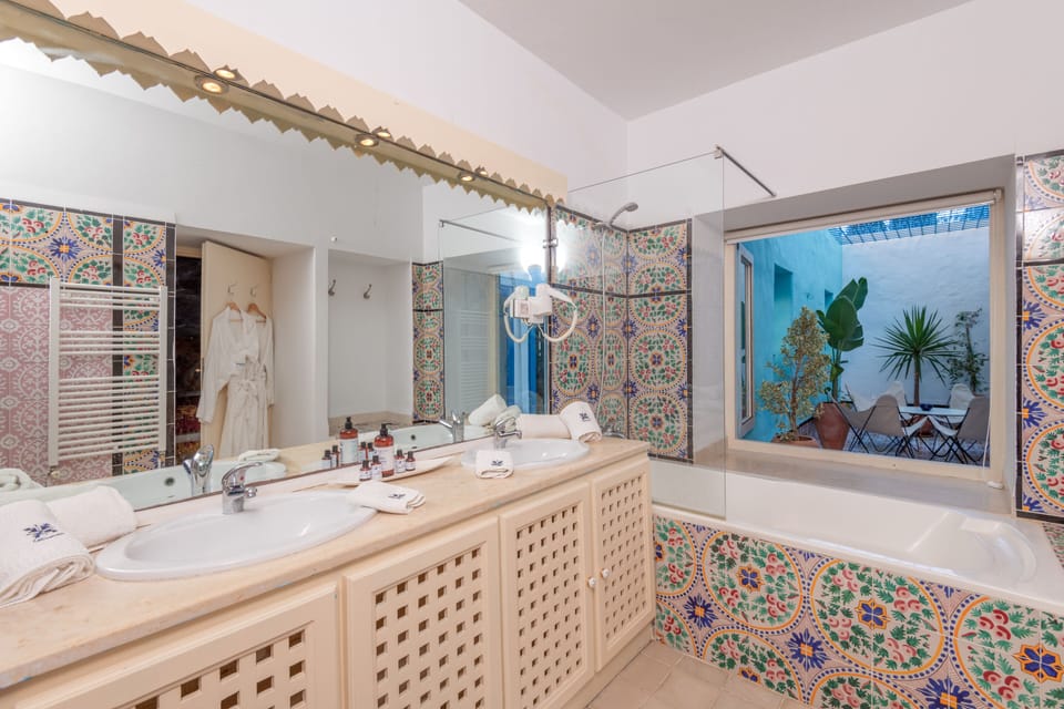 Hair dryer, bathrobes, towels, soap