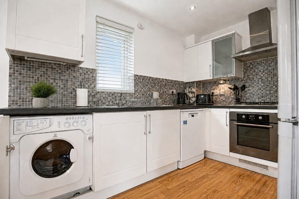 A fully equipped kitchen with everything you need to prepare a home cooked meal.