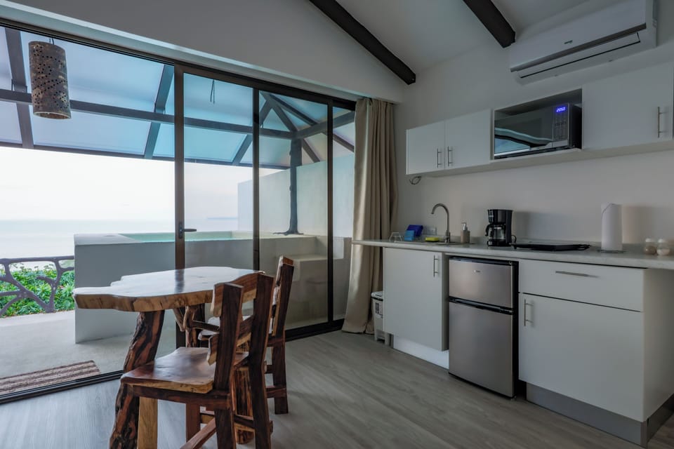 Romantic Studio Suite, 1 King Bed | Private kitchen | Coffee/tea maker, mini-fridge, microwave, cookware/dishes/utensils