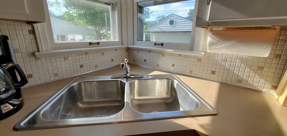 Double sink with dish soap provided 