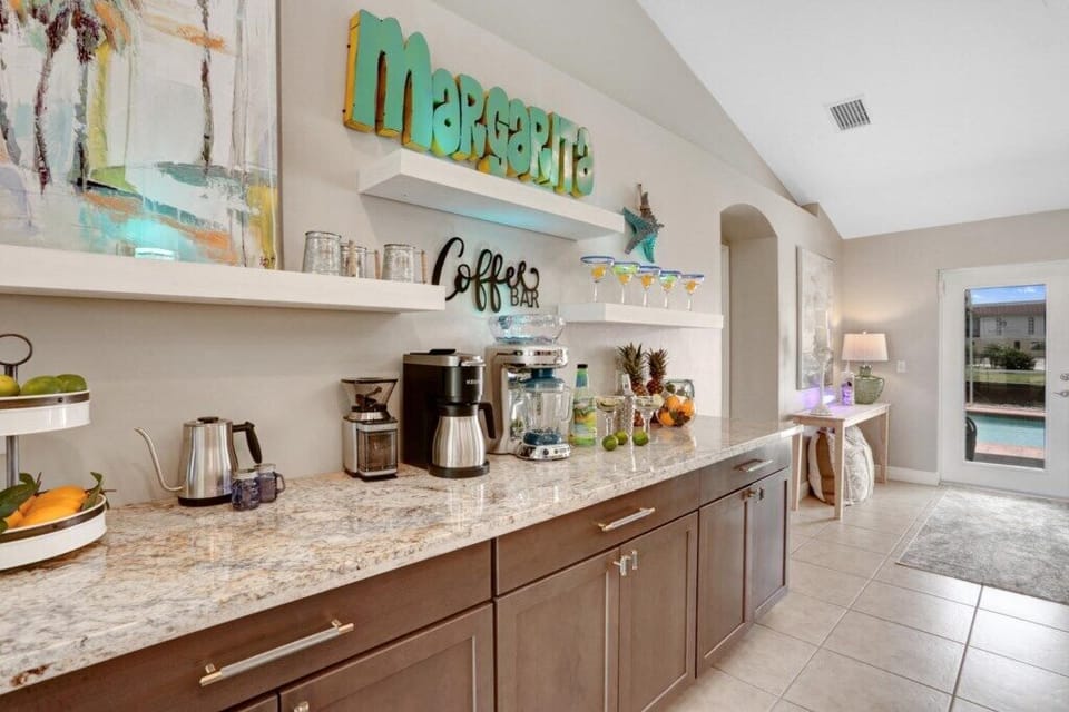 Chic coffee bar with margarita station, perfect for poolside refreshments.