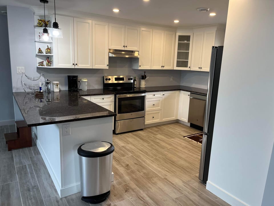 Kitchen - stove, full size fridge, dishwasher, microwave.