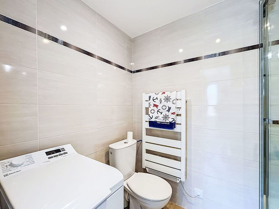 Flooring, Floor, Interior Design, Bathroom, Plumbing Fixture, Tile, Ceiling, Toilet, Plumbing, Toilet Seat