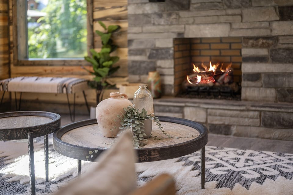 Living Room: Gather around the warm glow of the fireplace, surrounded by stylish decor!