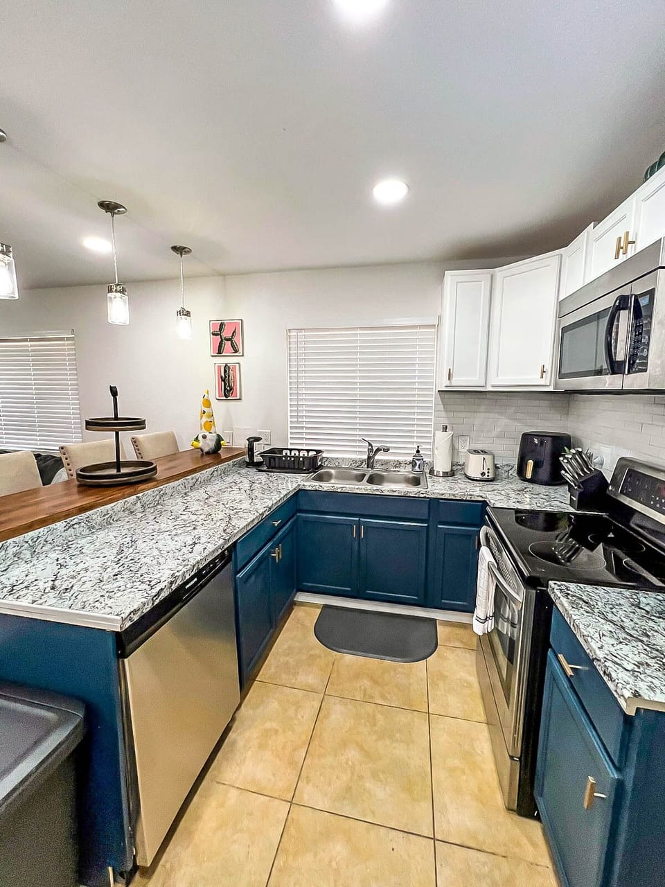 Welcome to the kitchen, complete with microwave, dishwasher, Keurig & more!