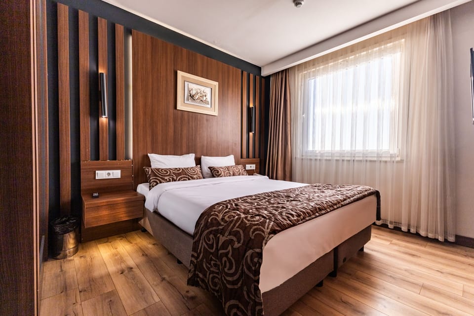 Hypo-allergenic bedding, free minibar, in-room safe, blackout drapes